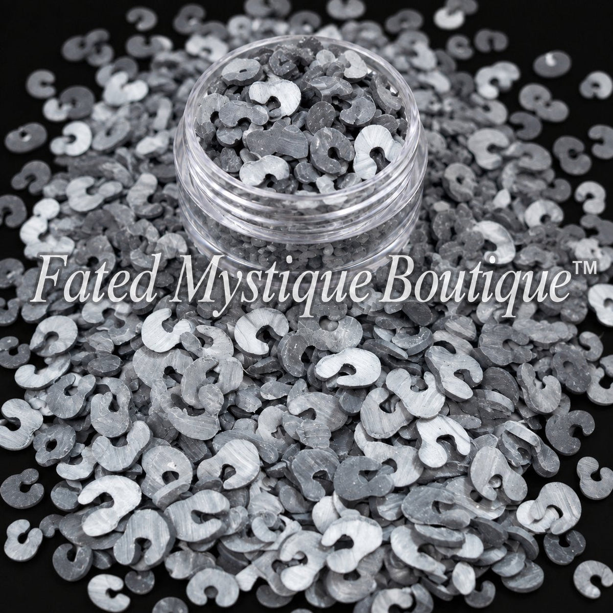 Black cheetah-print polymer clay slices in black, gray and white