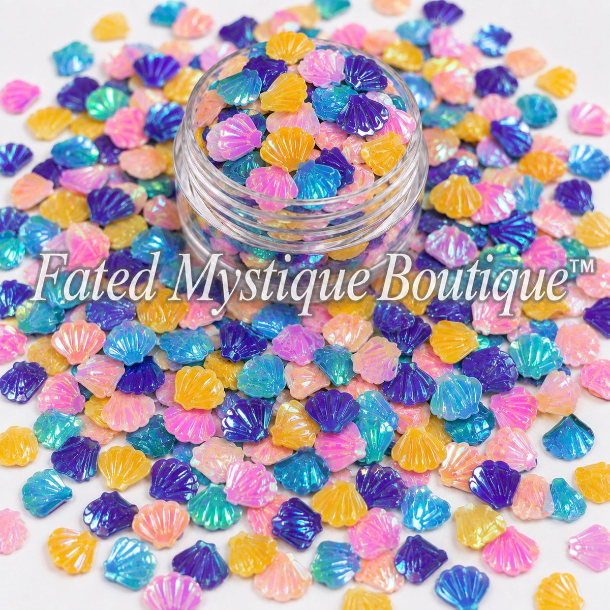 Shell-shaped glitter and clay embellishments for beach snow globe tumblers and DIY crafts