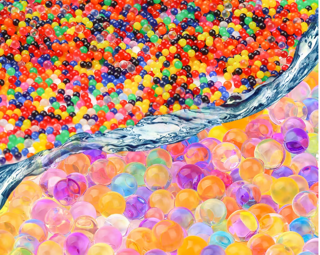 Colorful water beads with water flowing through them