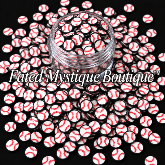 Black-edged white baseball polymer clay slices with red stitching in an open clear jar on a black background