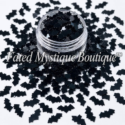 Bat-shaped glitter and clay embellishments for Halloween snow globe tumblers and DIY crafts