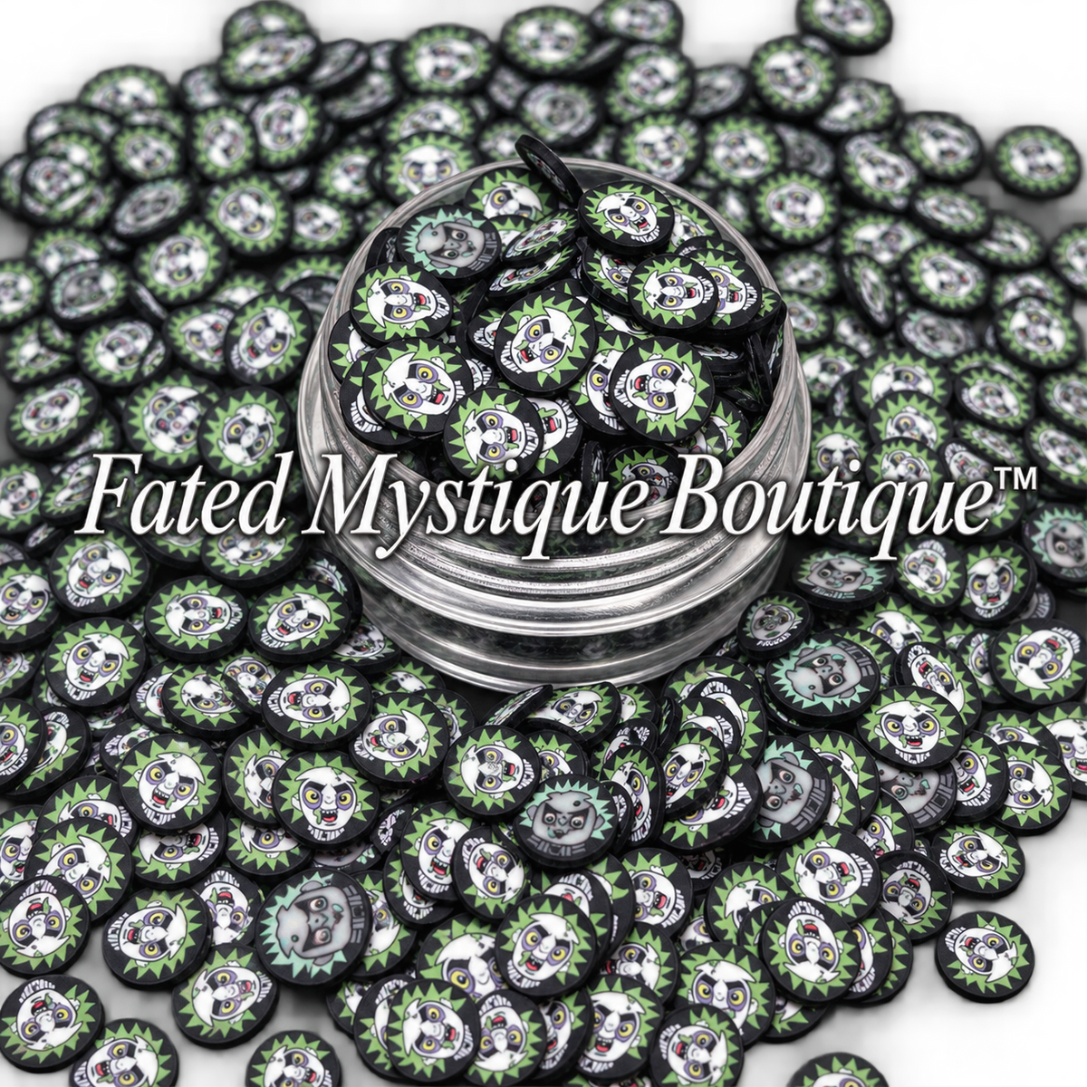 Beetlejuice polymer clay slices in a clear jar on a black background — Fated Mystique Boutique