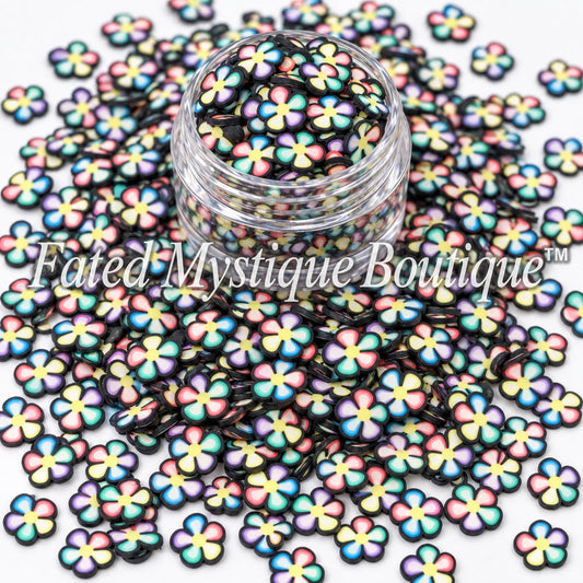 Black flower polymer clay slices for floral snow globe tumblers slime and DIY craft projects