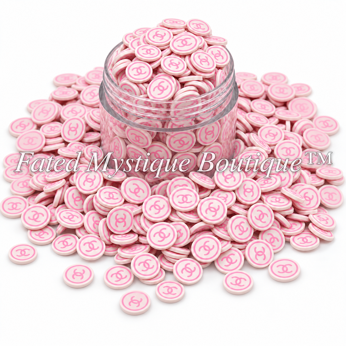 Pink Chanel-style polymer clay slices in a clear jar and scattered on white, Fated Mystique Boutique