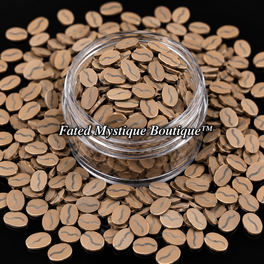 Coffee bean polymer clay slices displayed in a clear jar with scattered slices on a black background