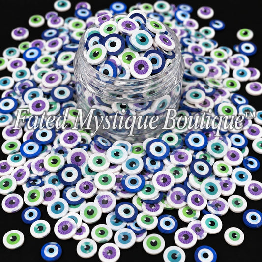 Eyeball polymer clay slices for Halloween snow globe tumblers slime and spooky DIY crafts