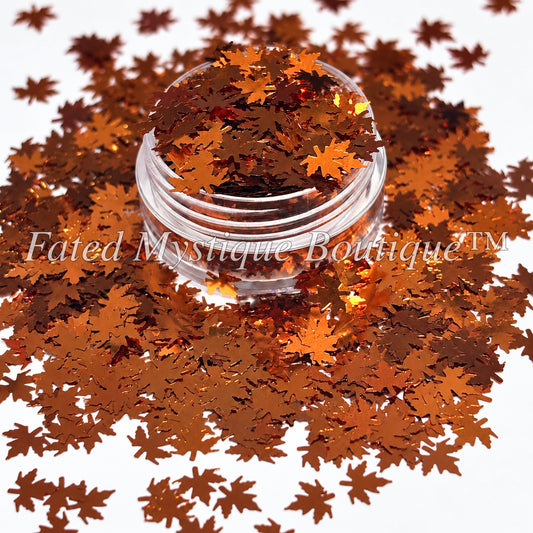 Copper metallic autumn leaf-shaped glitter in a clear jar — Fated Mystique Boutique
