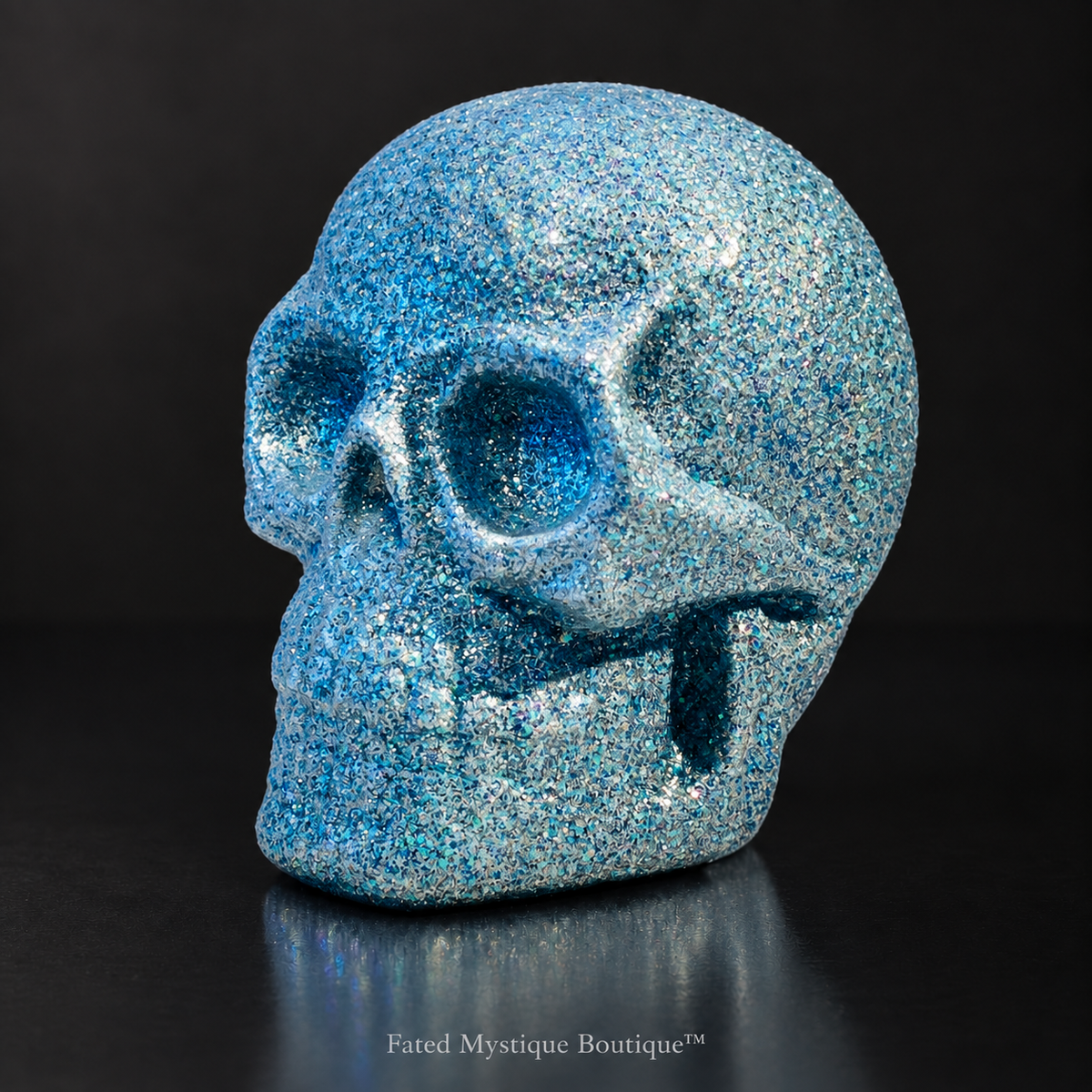 Light blue glow in the dark glitter skull head for gothic Halloween decor — charcoal studio mockup