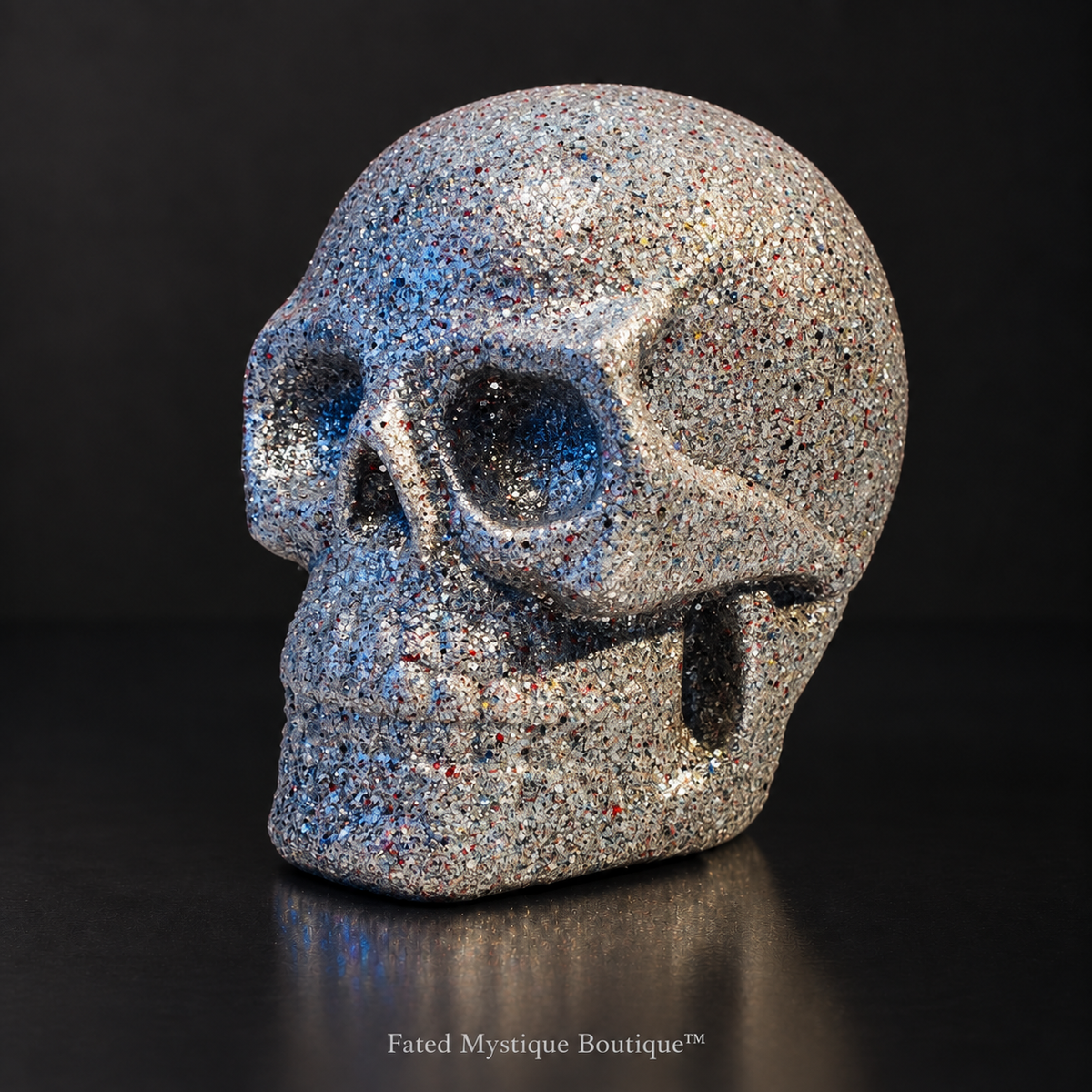 Silver glow-in-the-dark glitter skull head for gothic Halloween tabletop decor — charcoal studio mockup