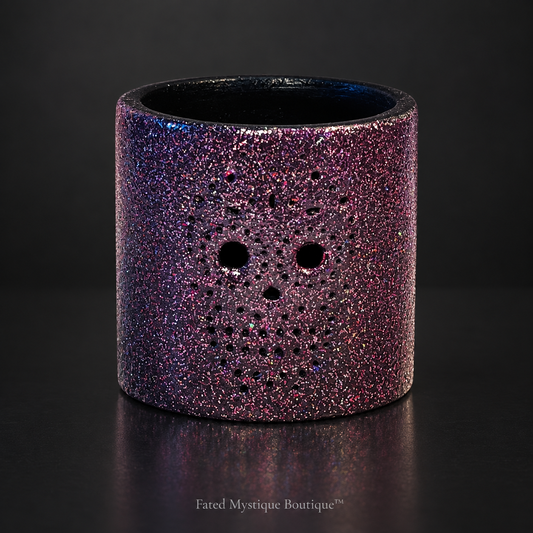 A tealight candle holder designed to resemble a skull, holding several tealight candles, placed on a table with a brick wall in the background. — charcoal studio mockup