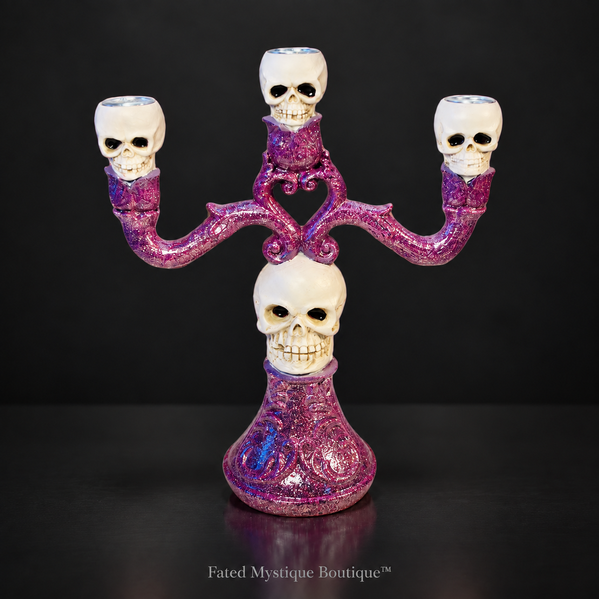 Three-tier skull candle stand for gothic Halloween tabletop and home decor — charcoal studio mockup