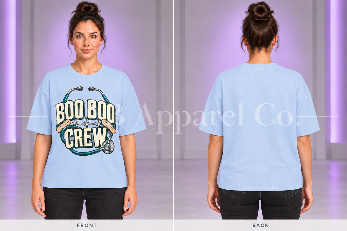 Light Blue Boo Boo Crew T-shirt, front and back on model in gray studio with purple lighting