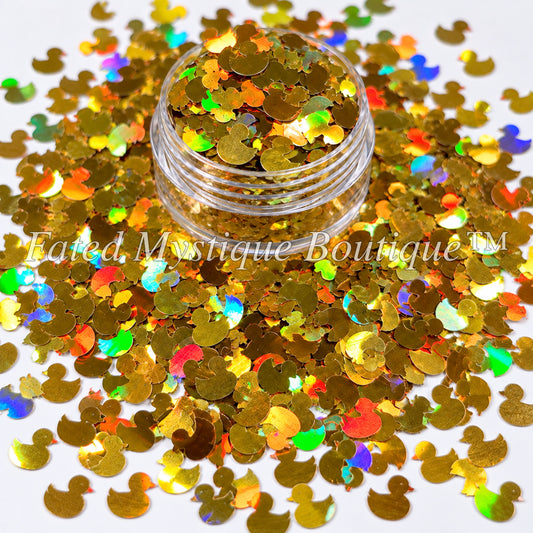 Gold holographic duckie-shaped glitter in a clear jar for tumblers and crafts — Fated Mystique Boutique
