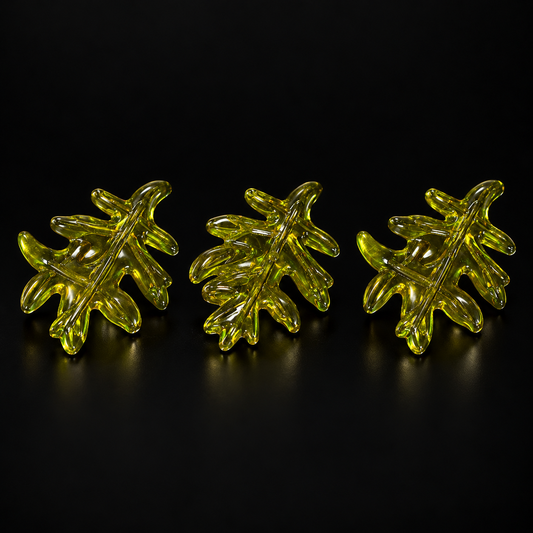 Green Leaf Charms, 3 pieces clearance pack, shown on a black studio background