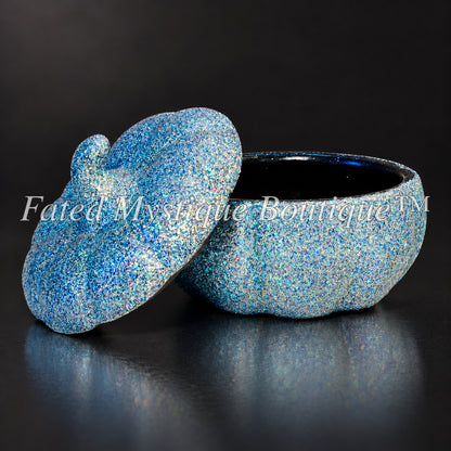 Light blue glow-in-the-dark glitter pumpkin trinket jar shown open — Fated Mystique Boutique