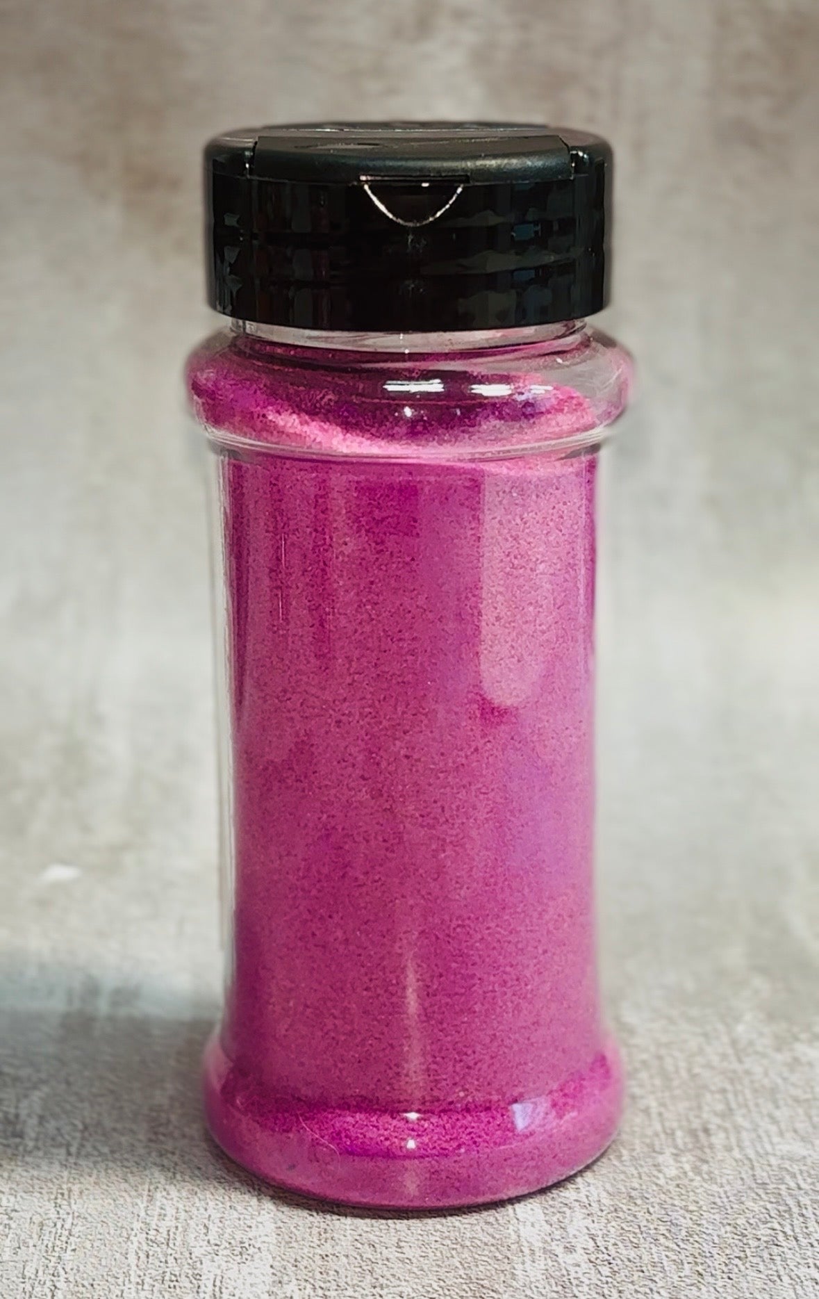 magenta colored sand