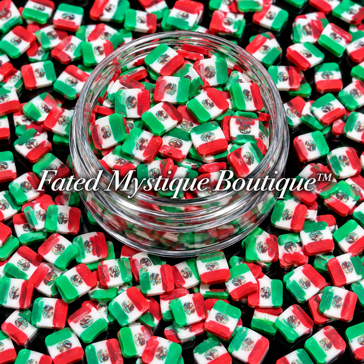 Mexican Flag polymer clay slices in a clear jar with loose slices on a black background