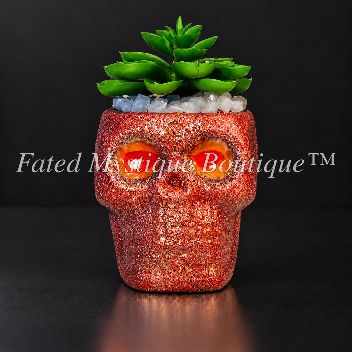 Red glow-in-the-dark skull artificial succulent planter with orange glowing eyes — Fated Mystique Boutique
