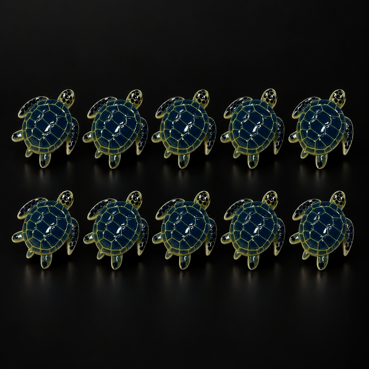 Sea Turtle Charms – 10 Pieces on a black studio background