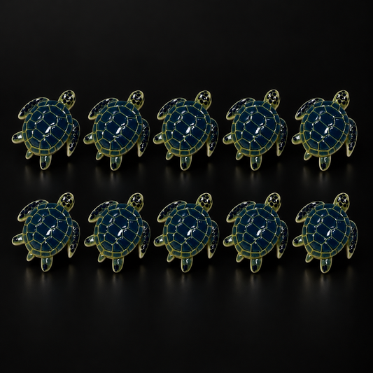 Sea Turtle Charms – 10 Pieces on a black studio background
