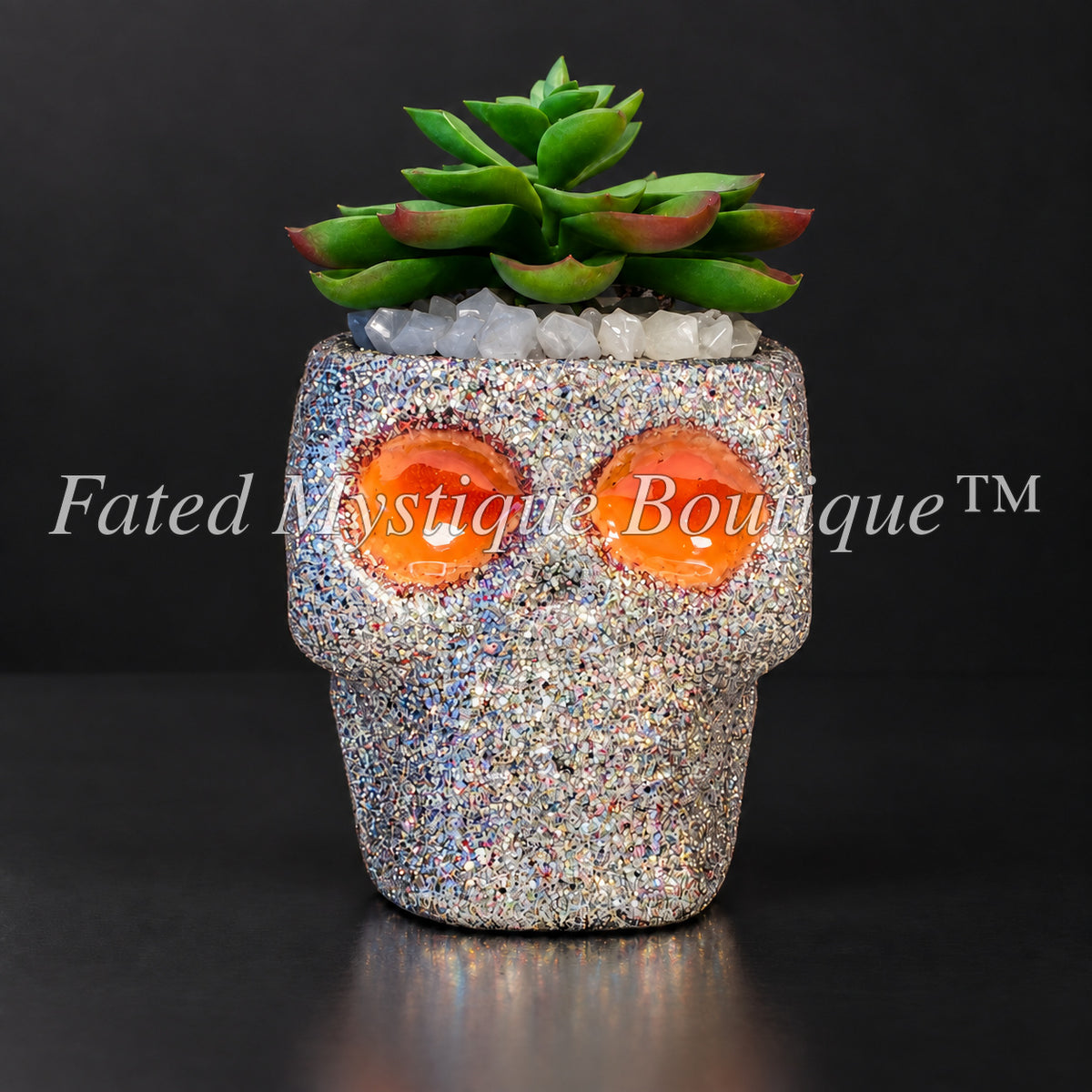 Silver glow-in-the-dark skull artificial succulent planter with orange glowing eyes — Fated Mystique Boutique
