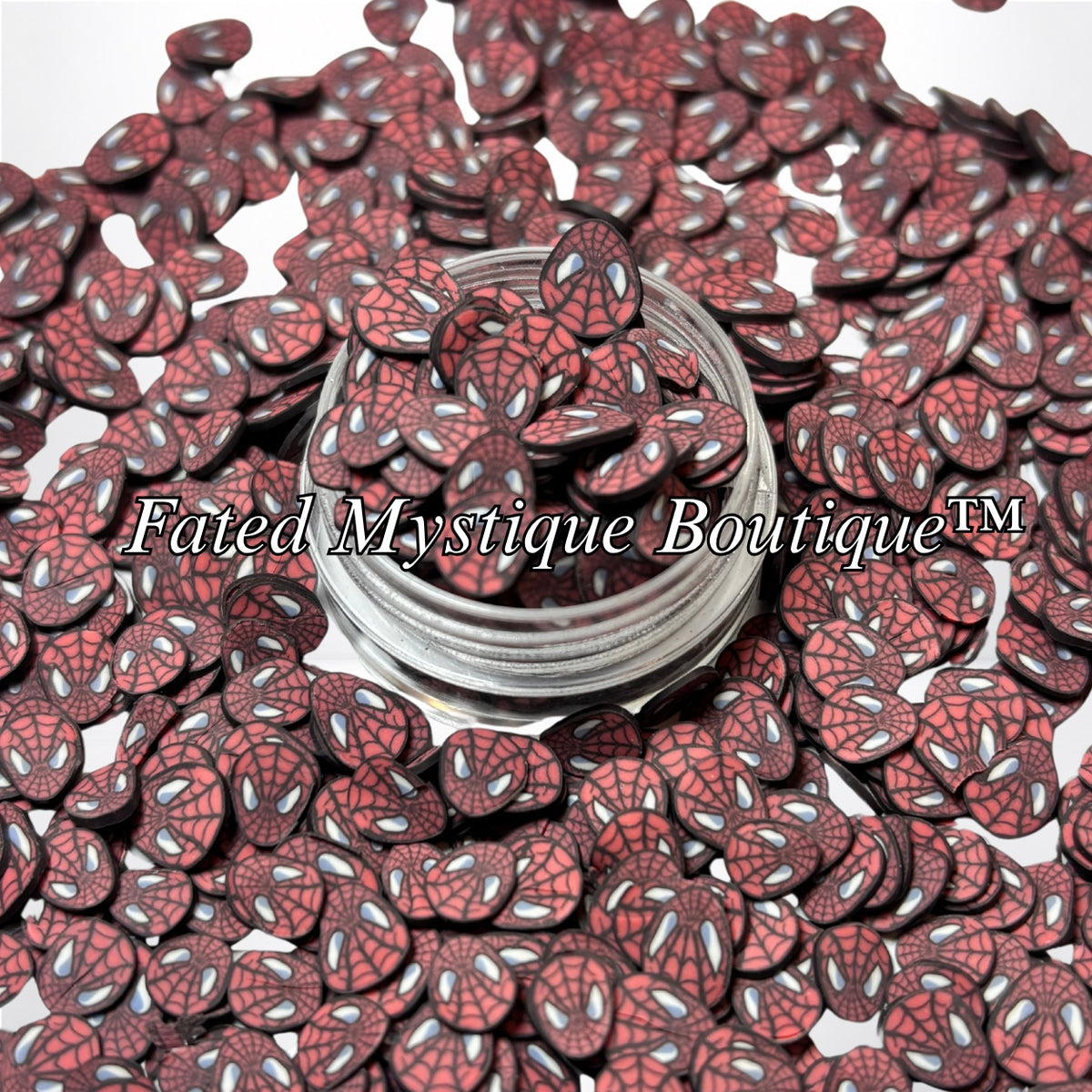 Spider-Man red mask polymer clay slices displayed in a clear jar with scattered slices