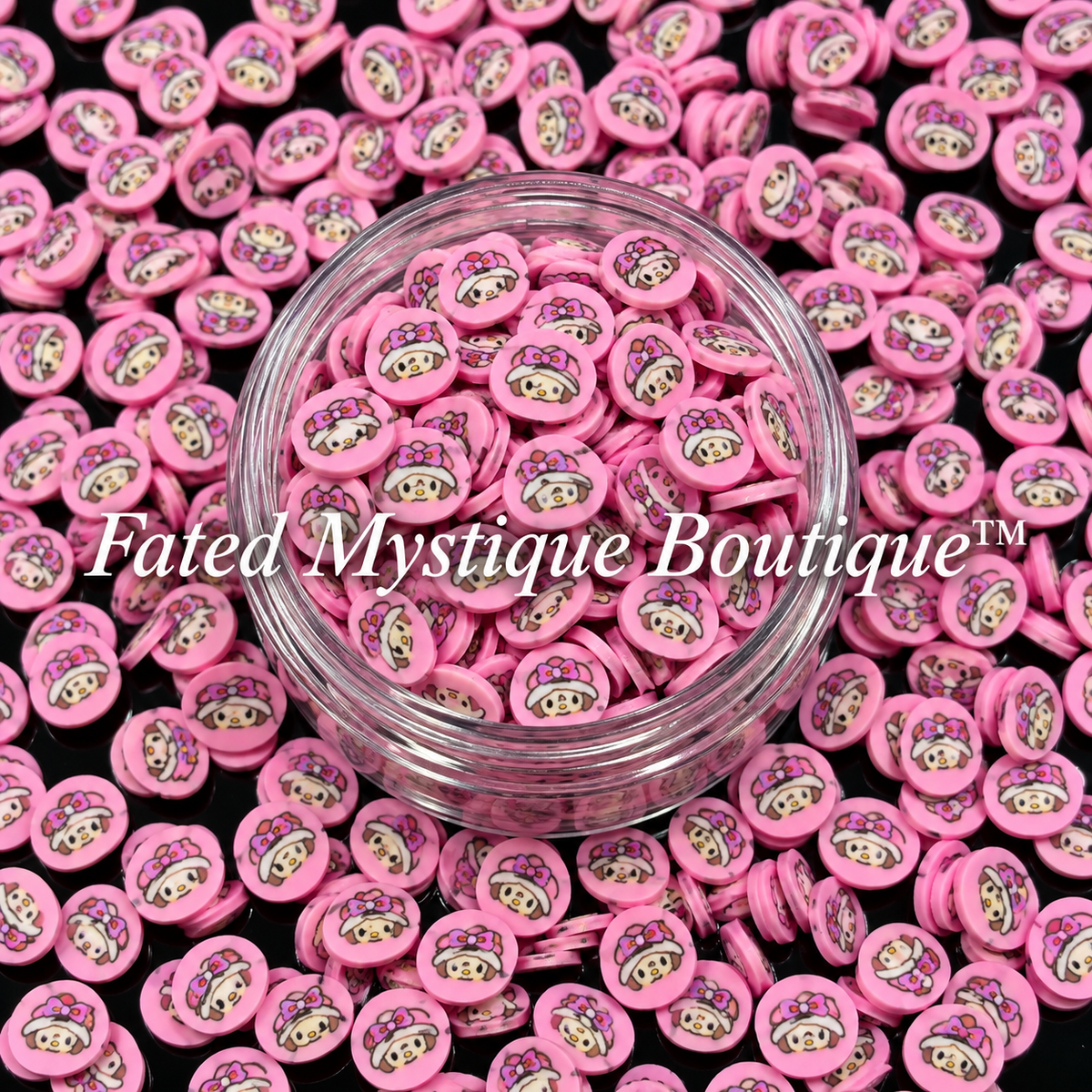Strawberry Shortcake polymer clay slices in a clear jar with loose slices on a black background