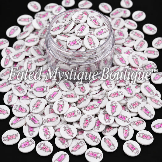 Syringe-shaped polymer clay slices for medical-themed snow globe tumblers and DIY crafts