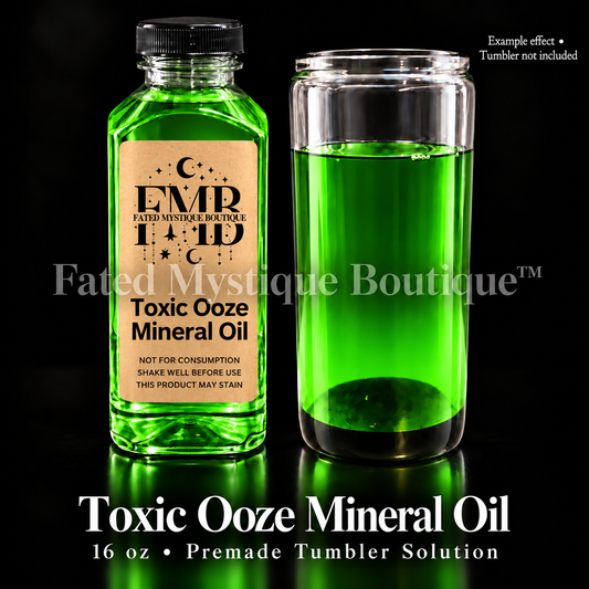 Toxic Ooze Mineral Oil — 16 oz bottle beside a clear tumbler showing the oil color; example effect, tumbler not included.