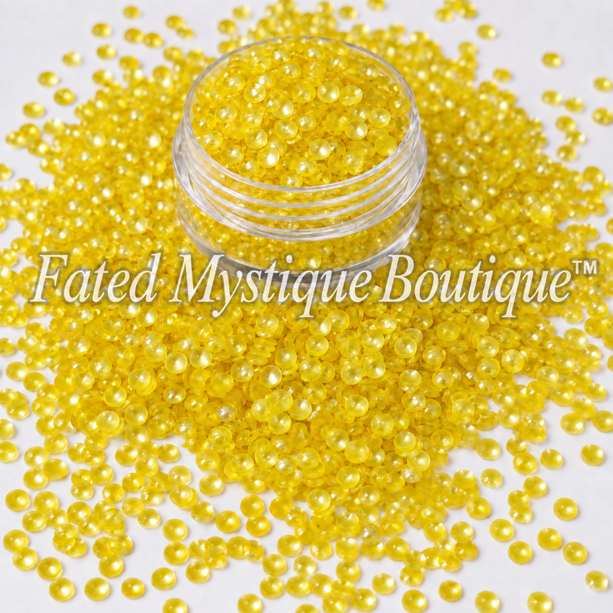 Yellow bubble glitter displayed in an open clear jar with a generous spill; Fated Mystique Boutique™